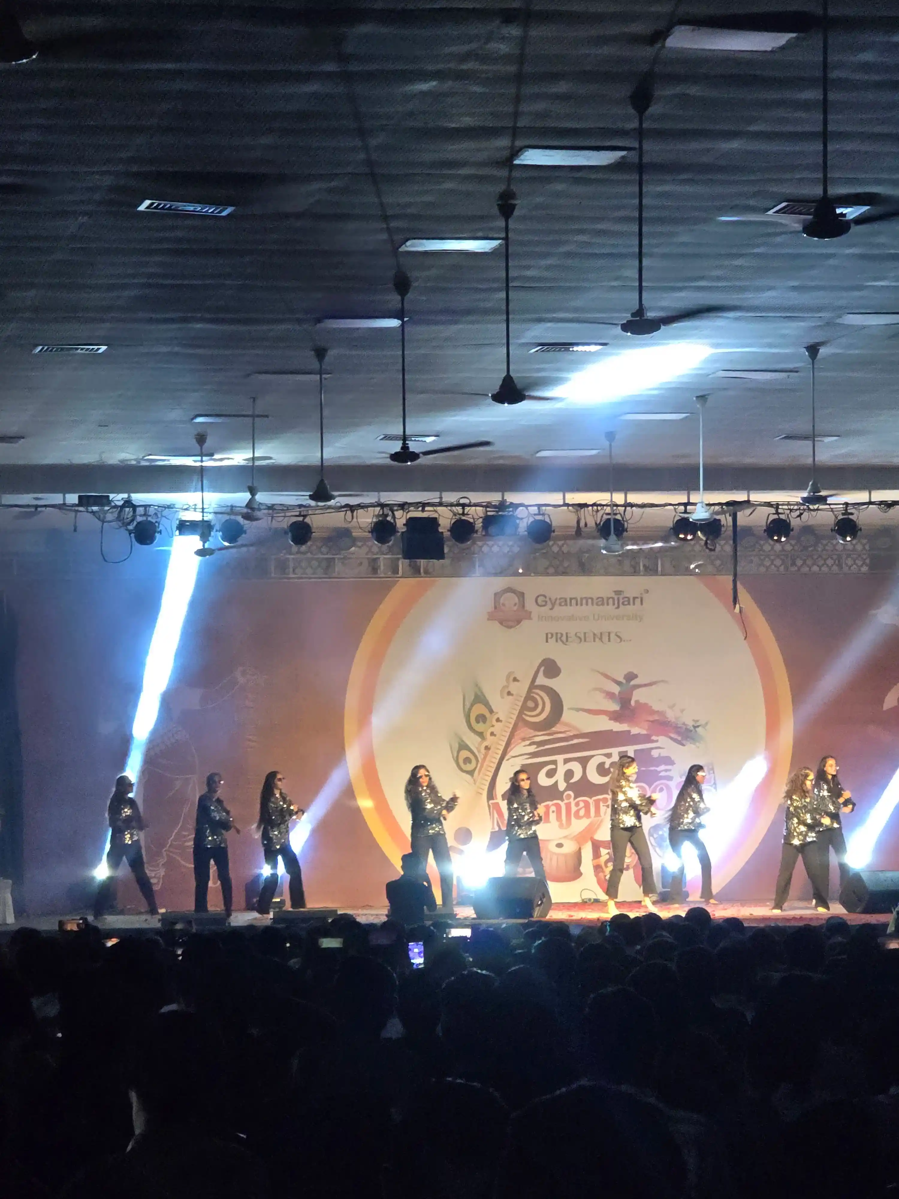 Joyful GMIU student crowd celebrating at the annual cultural festival